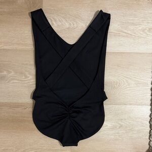 Black Londre cross back. Medium regular length.